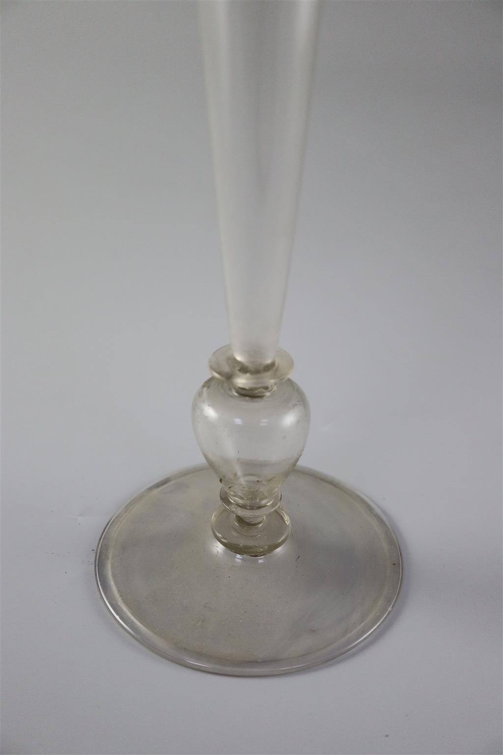 A tall Dutch glass flute, last quarter 17th century, 39cm high